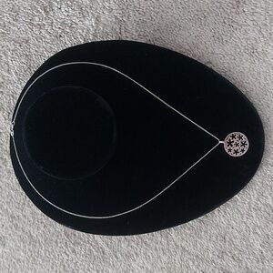 Sterling silver necklace with floral pendant